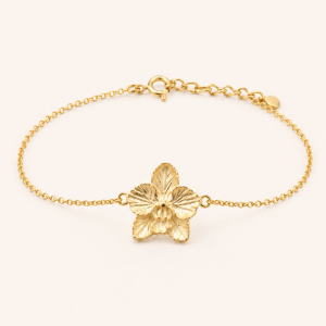 Orchid Bracelet – 14K Gold A delicate bracelet handcrafted in solid 14K gold, featuring a beautifully detailed orchid at its center. Inspired by the intricate forms found in nature, each petal is carefully sculpted with fine organic textures, giving the flower a soft, lifelike quality.